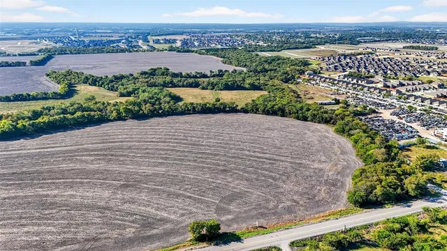 a view of a lake with a houses