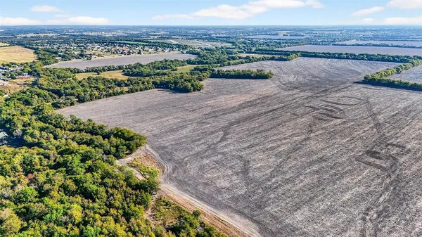 a view of a yard with an outdoor space