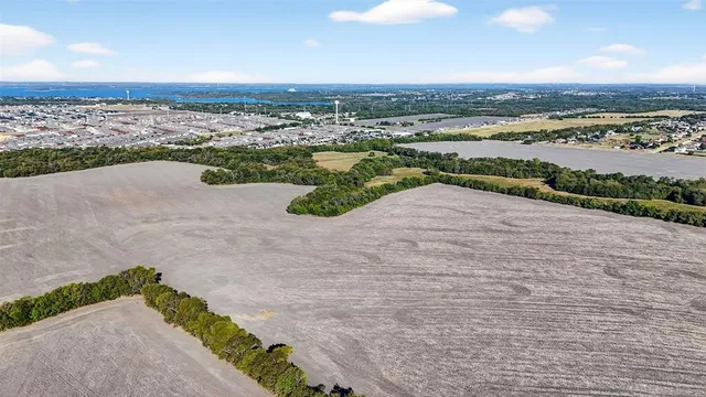a view of an ocean and city