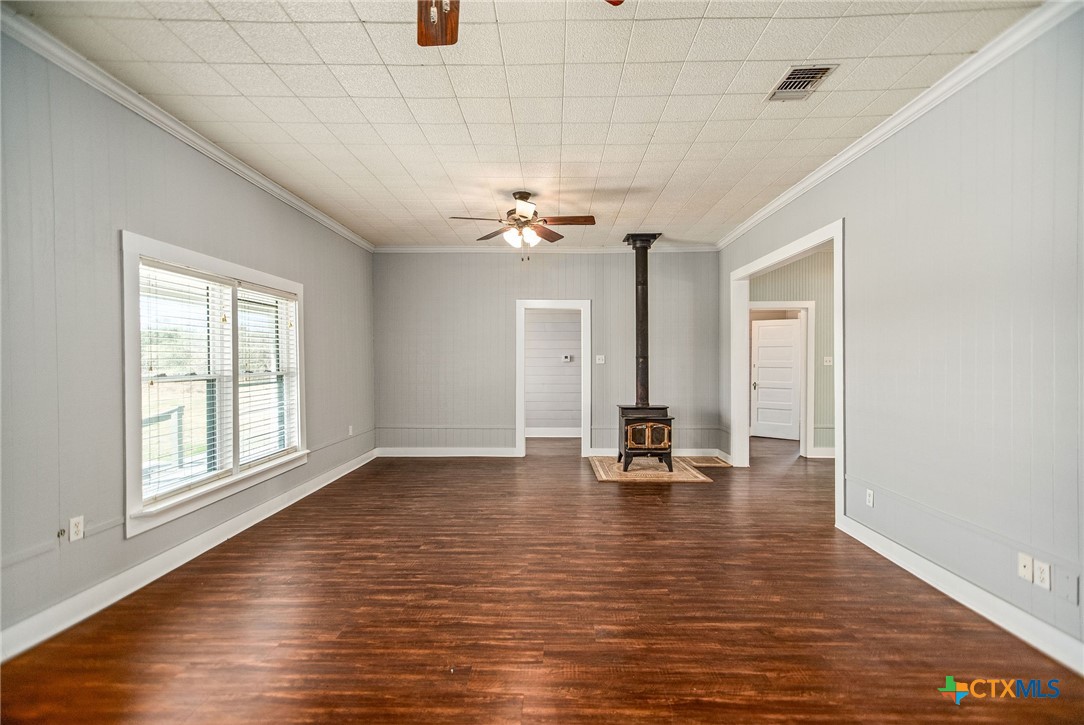 303 Garcitas Grove Road Inez, TX 77968 - Photo 7 of 39 wooden floor in an empty room with a window