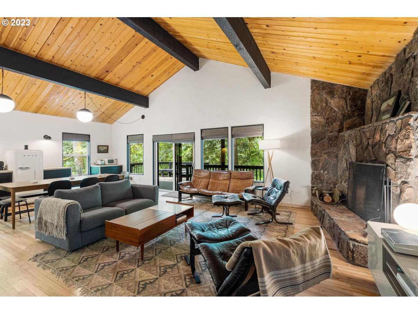 72715 East Village Loop Road Rhododendron, OR 97049 - Photo 7 of 48 a living room with furniture and a large window