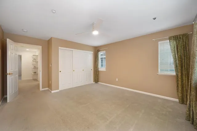 a house view with swimming pool and sitting space