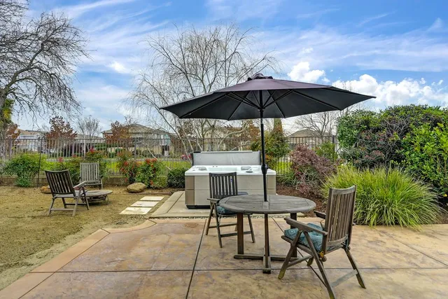 an aerial view of a house with a lake view