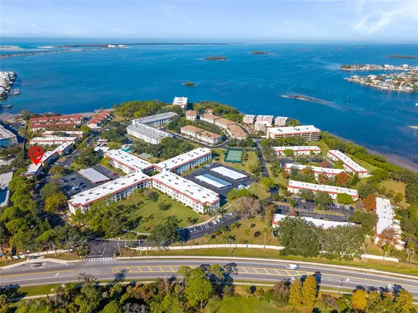 an aerial view of lake and city