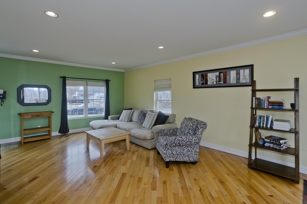 48 Mountain Avenue West Springfield, MA 01089 - Photo 4 of 39 a living room with furniture and a flat screen tv