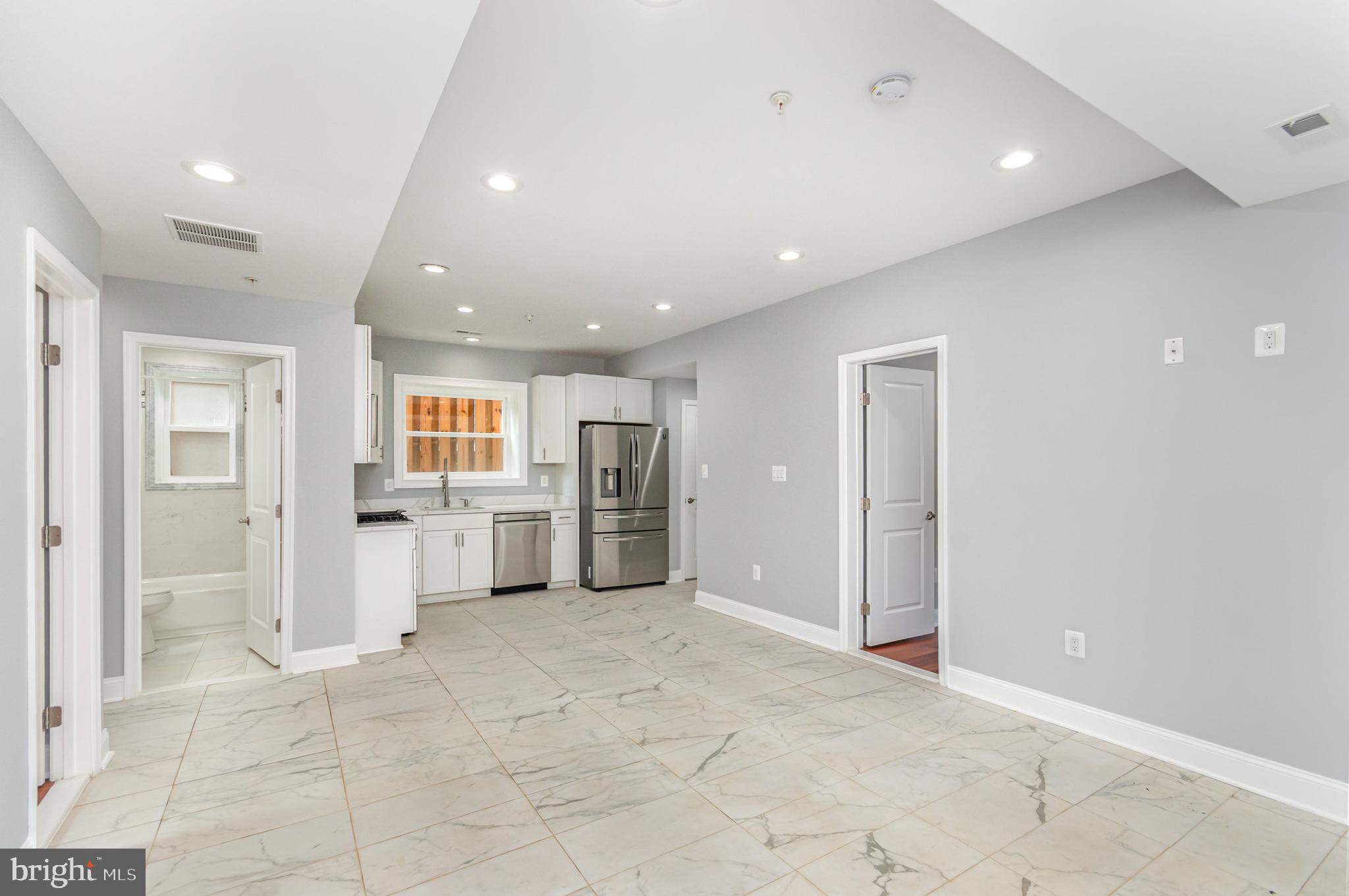 3110 Perry Street Mount Rainier, MD 20712 - Photo 21 of 24 a view of a kitchen with refrigerator and windows