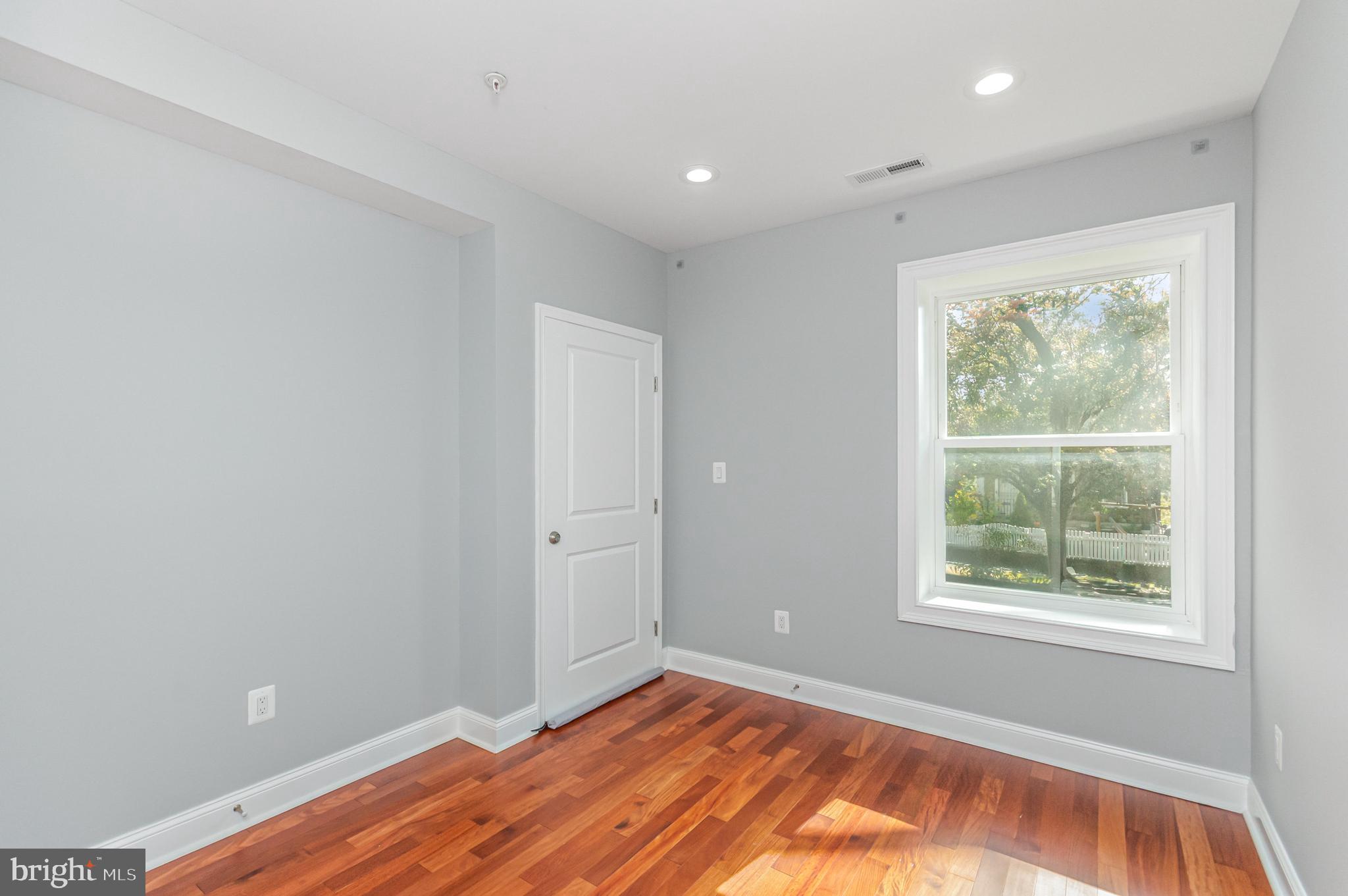 3110 Perry Street Mount Rainier, MD 20712 - Photo 7 of 24 a view of room with window and hardwood floor