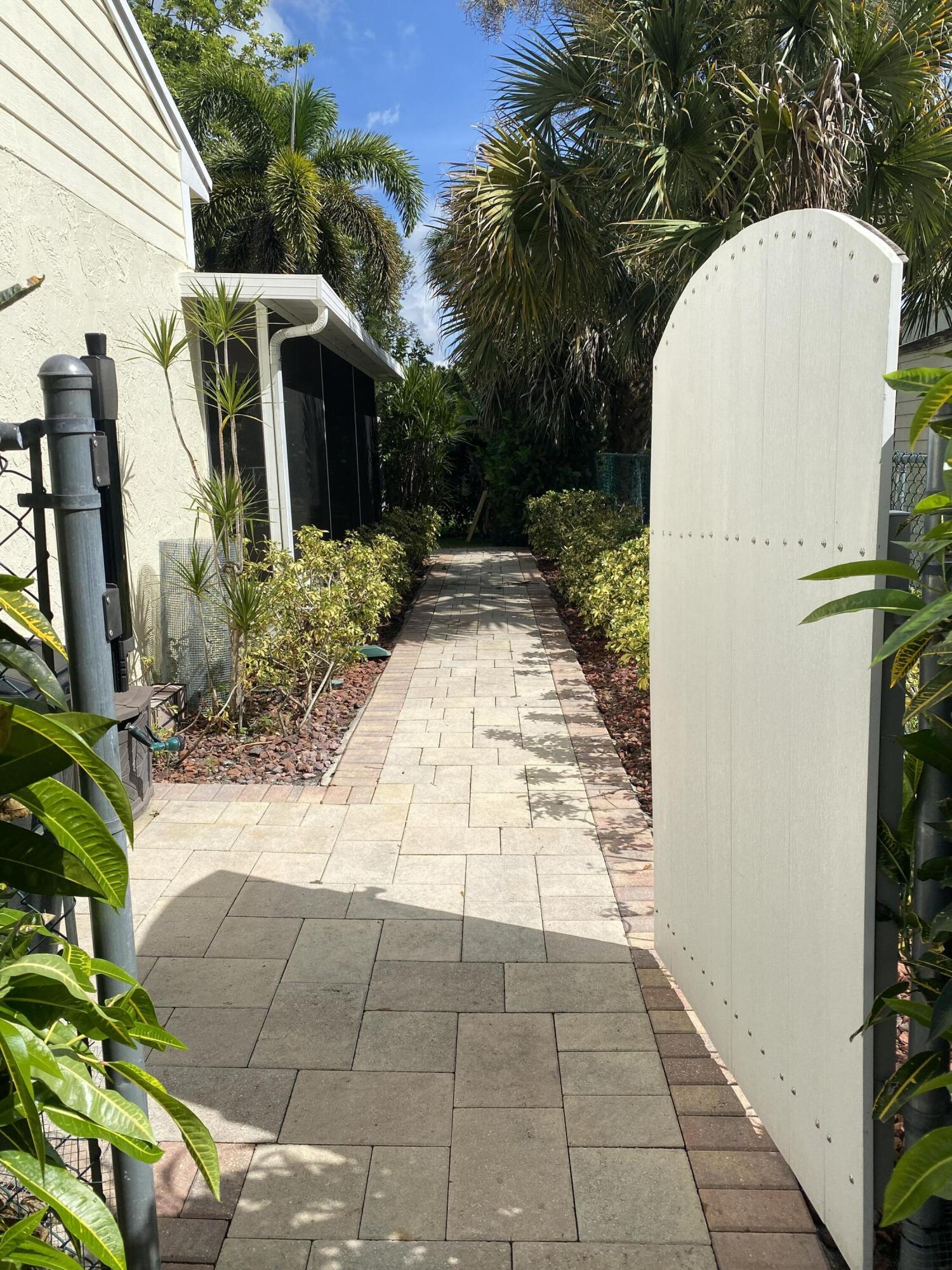 8233 Scenic Turn Boca Raton, FL 33433 - Photo 30 of 39 Fenced Backyard