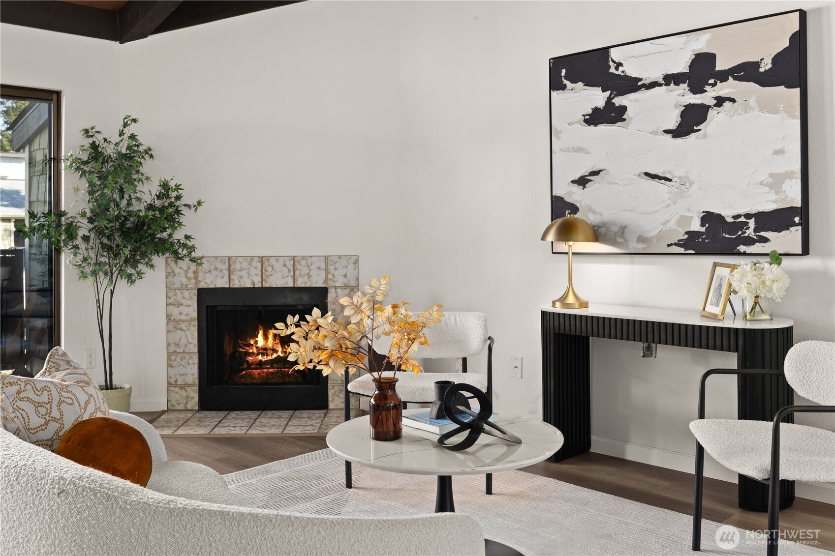 2020 Grant Avenue South, Unit A303 Renton, WA 98055 - Photo 2 of 17 a living room with furniture and a fireplace