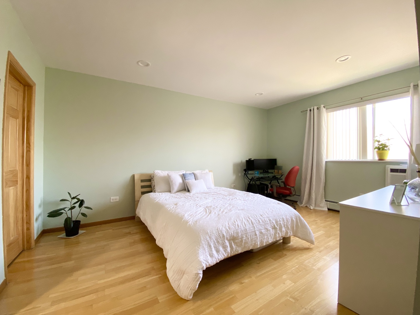 280 North Westgate Road, Unit 427 Mount Prospect, IL 60056 - Photo 13 of 23 a bedroom with a bed and a couch