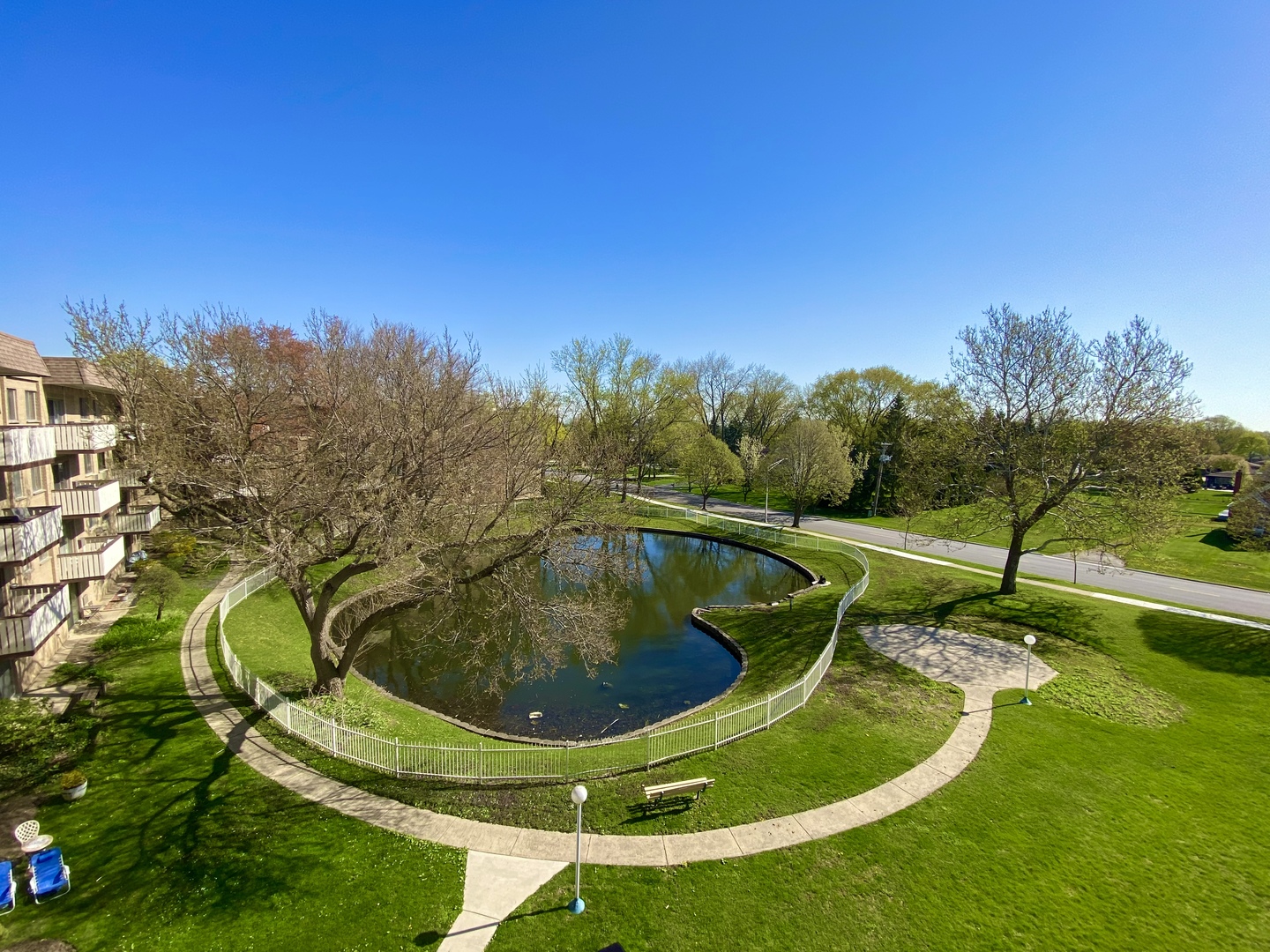 280 North Westgate Road, Unit 427 Mount Prospect, IL 60056 - Photo 19 of 23 a view of a swimming pool with a yard