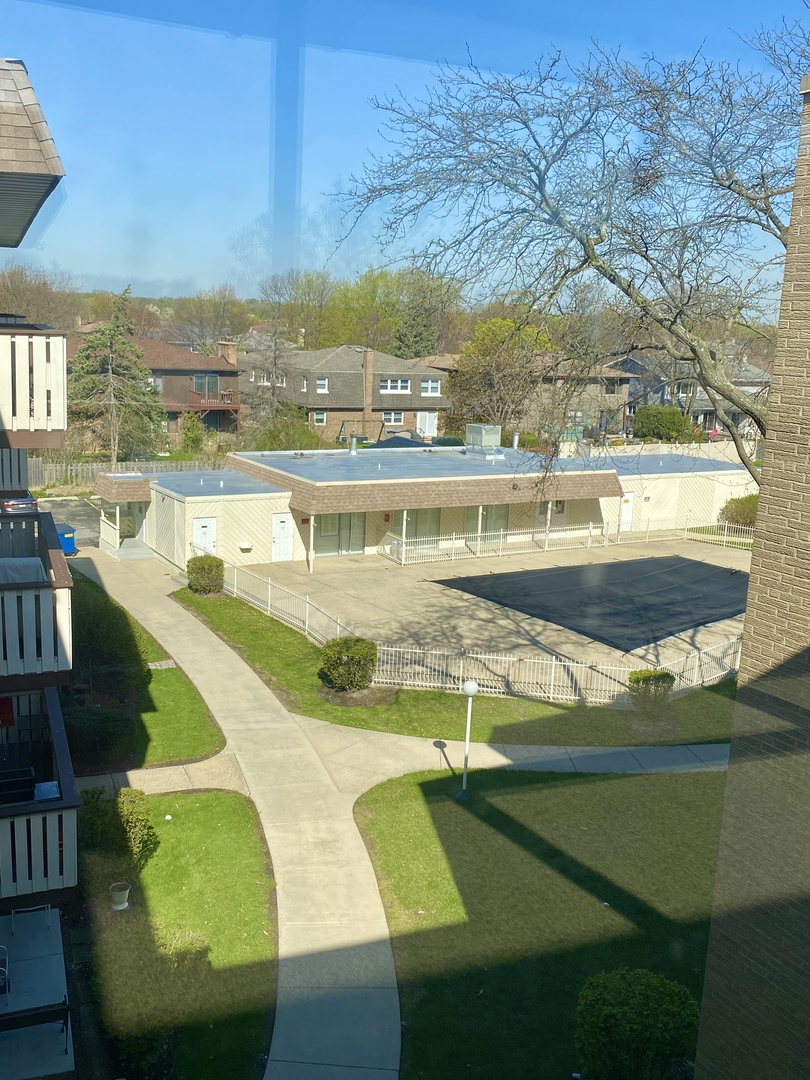 280 North Westgate Road, Unit 427 Mount Prospect, IL 60056 - Photo 22 of 23 a view of a swimming pool with an outdoor seating