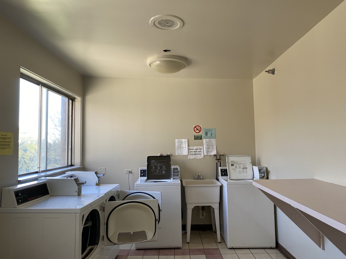 280 North Westgate Road, Unit 427 Mount Prospect, IL 60056 - Photo 23 of 23 a bathroom with a granite countertop sink a mirror and a bathtub