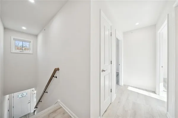 a view of a hallway with closet