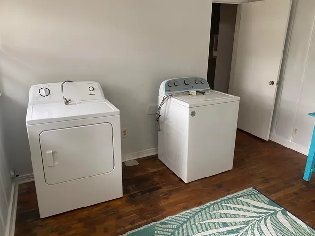 a utility room with dryer and washer
