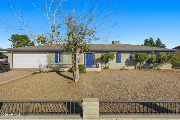 a house view with a garden space