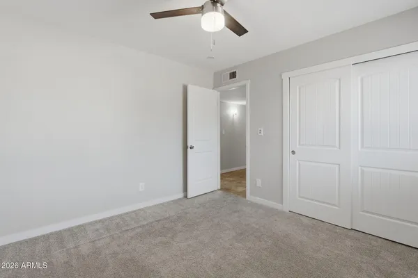 a view of an outdoor space with a table and chairs