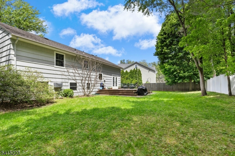 33 Carol Road Westfield, NJ 07090 - Photo 23 of 23 a view of a house with a backyard