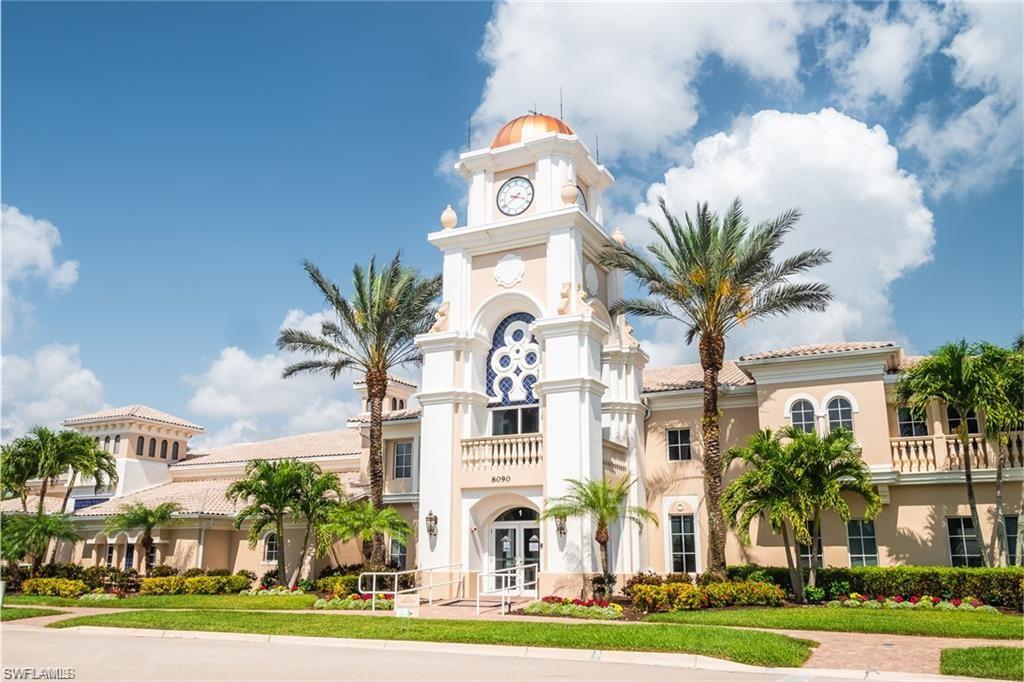 8482 Karina Court Naples, FL 34114 - Photo 28 of 40 a front view of multiple houses with yard