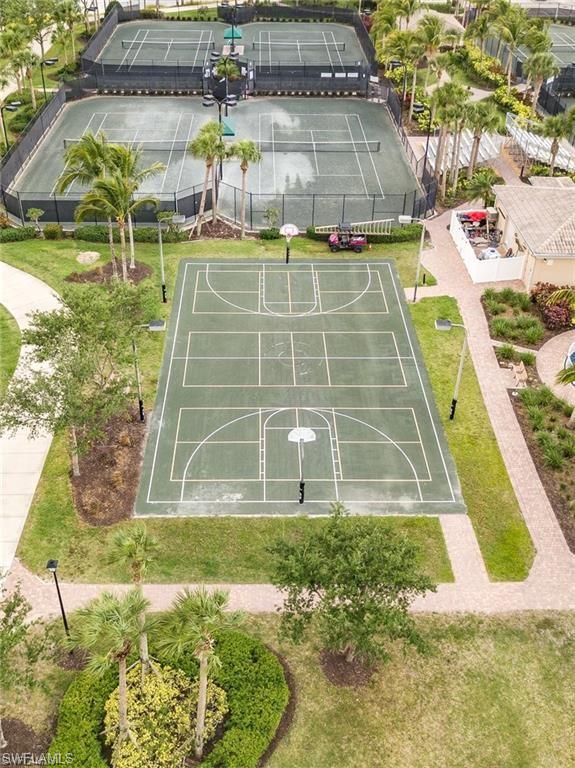 8482 Karina Court Naples, FL 34114 - Photo 34 of 40 a view of a swimming pool
