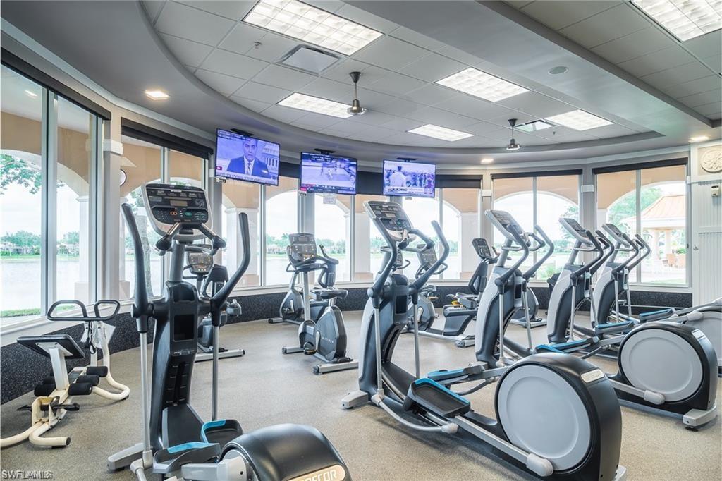 8482 Karina Court Naples, FL 34114 - Photo 38 of 40 a view of a room with gym equipment
