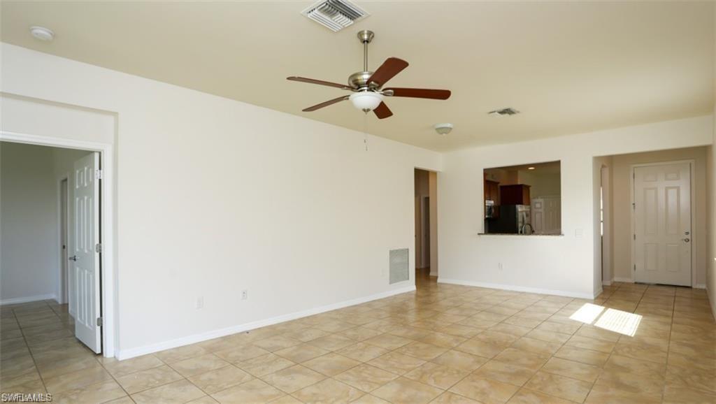 8482 Karina Court Naples, FL 34114 - Photo 7 of 40 a view of an empty room