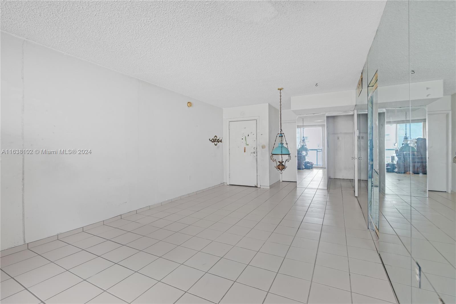 1345 Lincoln Road, Unit PH6 Miami Beach, FL 33139 - Photo 7 of 35 a view of a room with a hallway