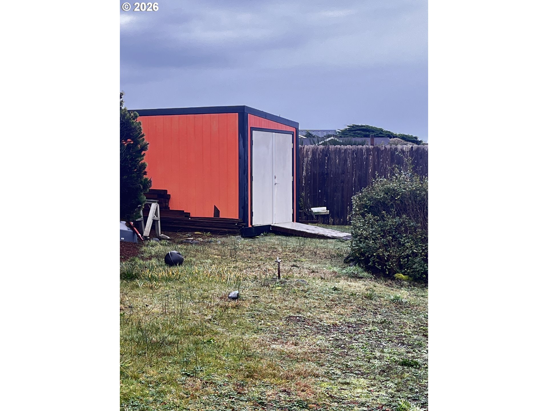 33130 Nesika Road, Unit A Gold Beach, OR 97444 - Photo 16 of 17 a view of a backyard