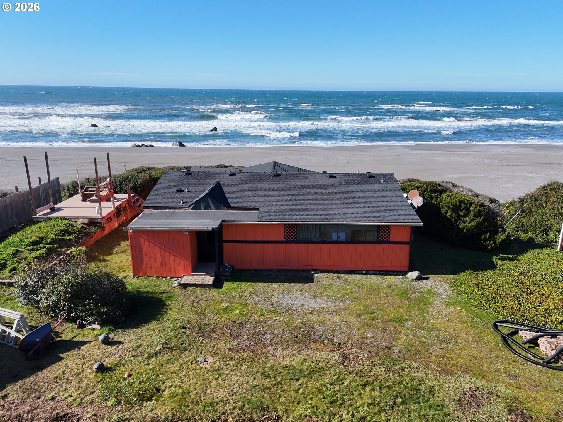 33130 Nesika Road, Unit A Gold Beach, OR 97444 - Photo 18 of 22 a view of a yard with an ocean view