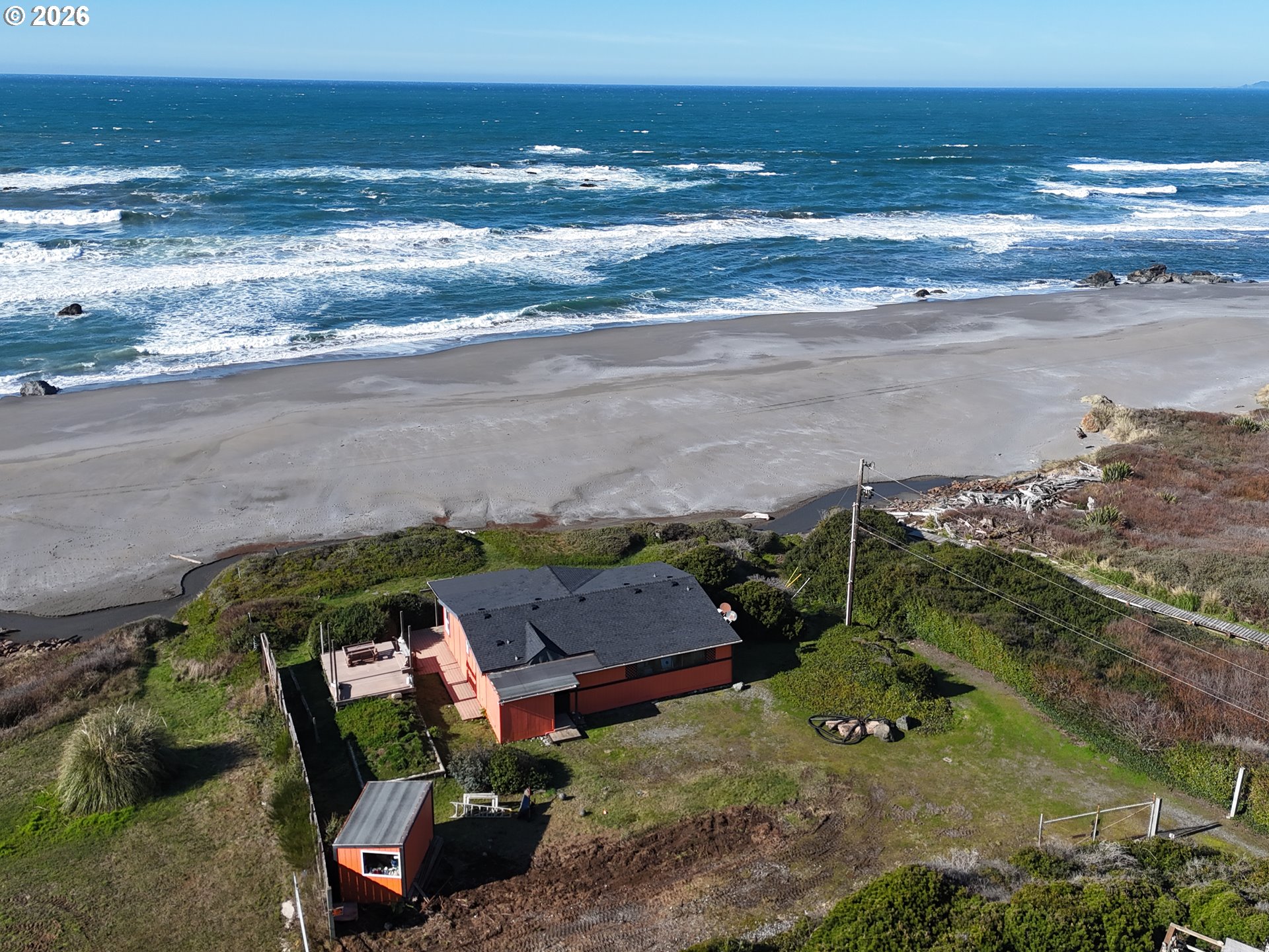 33130 Nesika Road, Unit A Gold Beach, OR 97444 - Photo 19 of 22 a view of an ocean and beach