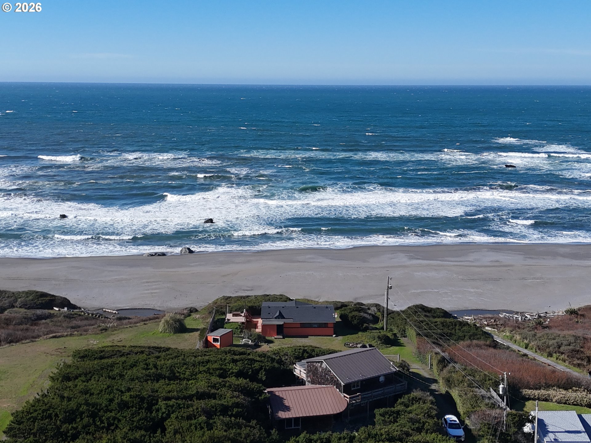 33130 Nesika Road, Unit A Gold Beach, OR 97444 - Photo 20 of 22 a view of an ocean and beach
