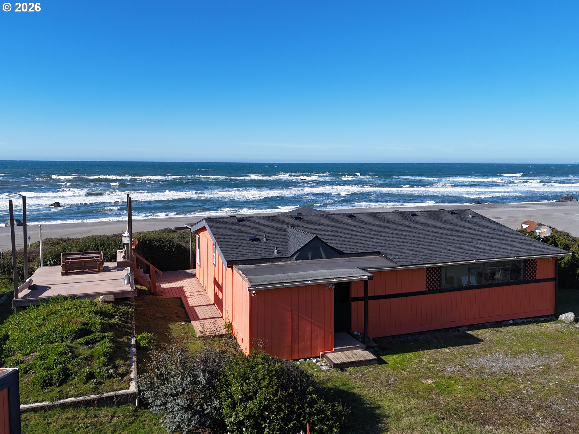 33130 Nesika Road, Unit A Gold Beach, OR 97444 - Photo 21 of 22 a view of a swimming pool with seating area