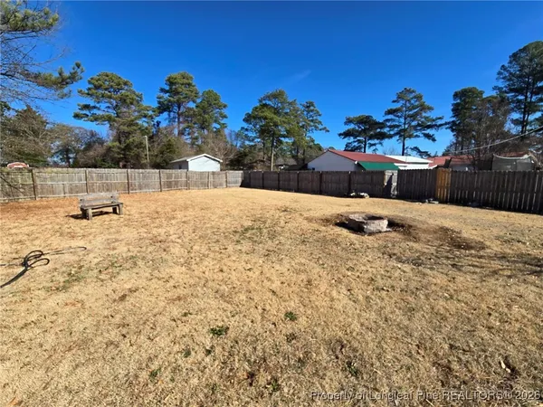 a view of a entryway of house with a yard