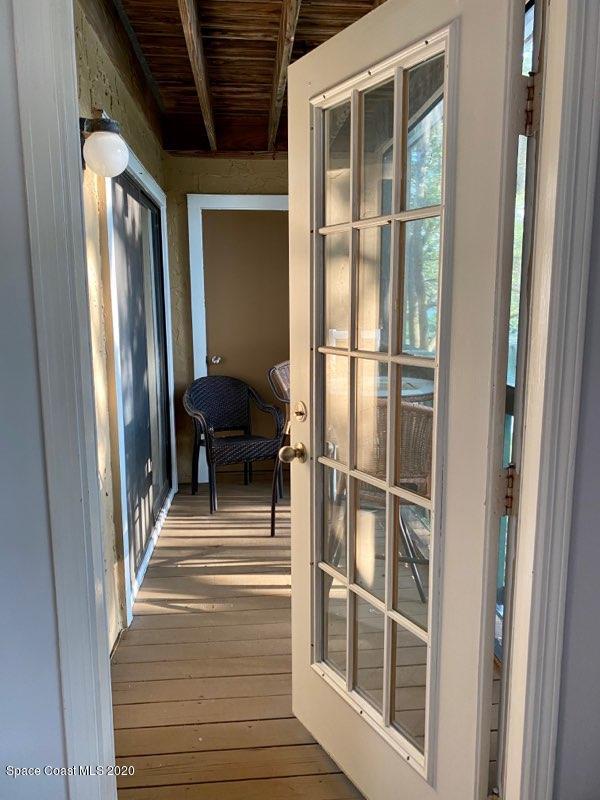 7667 North Wickham Road, Unit 214 Melbourne, FL 32940 - Photo 13 of 16 a view of a balcony from door