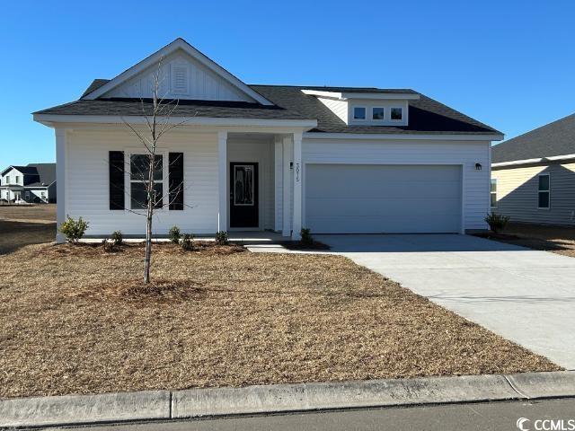 3075 Palma Way Myrtle Beach, SC 29579 - Photo 1 of 6 Ranch-style home with driveway and an attached gar