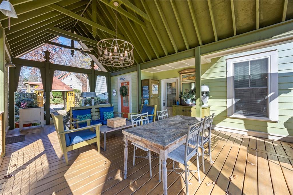 243 Bluegill Road Eatonton, GA 31024 - Photo 106 of 144 a view of a dining room with furniture window and wooden floor