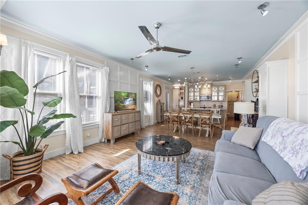 243 Bluegill Road Eatonton, GA 31024 - Photo 2 of 144 a living room with furniture and a wooden floor