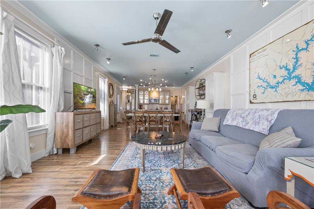 243 Bluegill Road Eatonton, GA 31024 - Photo 33 of 144 a living room with furniture and wooden floor