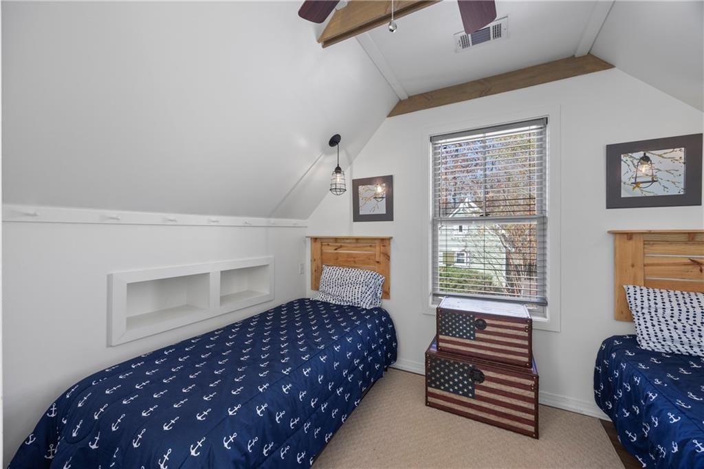 243 Bluegill Road Eatonton, GA 31024 - Photo 53 of 144 a bedroom with bed and window