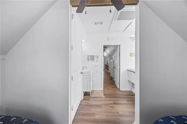 a view of swimming pool with outdoor seating and plants