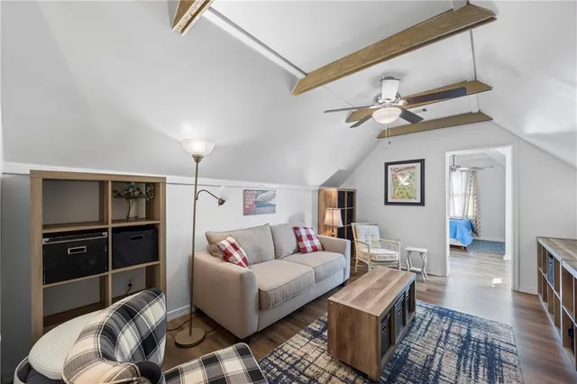 an aerial view of a houses with ocean view