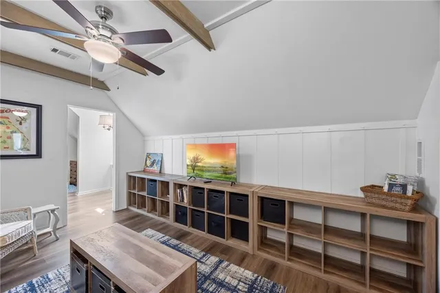 a view of a lake in middle of forest