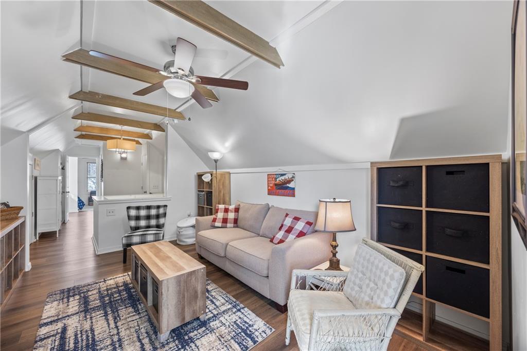 243 Bluegill Road Eatonton, GA 31024 - Photo 61 of 144 a living room with furniture and a wooden floor