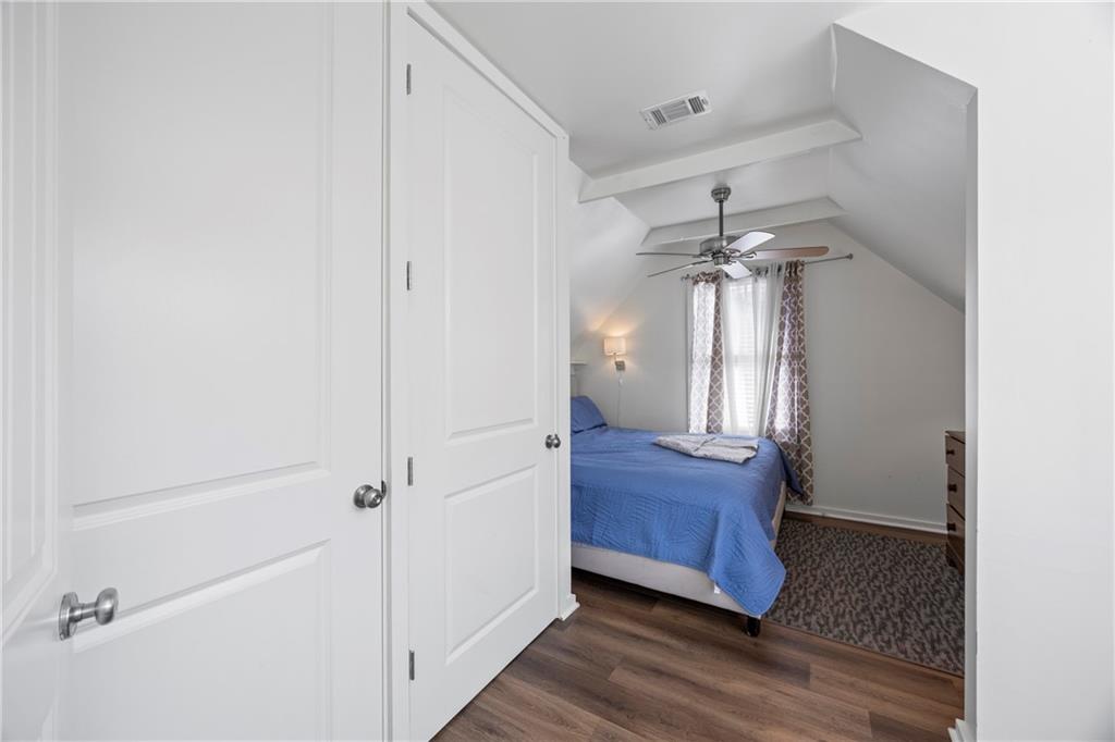 243 Bluegill Road Eatonton, GA 31024 - Photo 65 of 144 a view of a hallway view with wooden floor and staircase