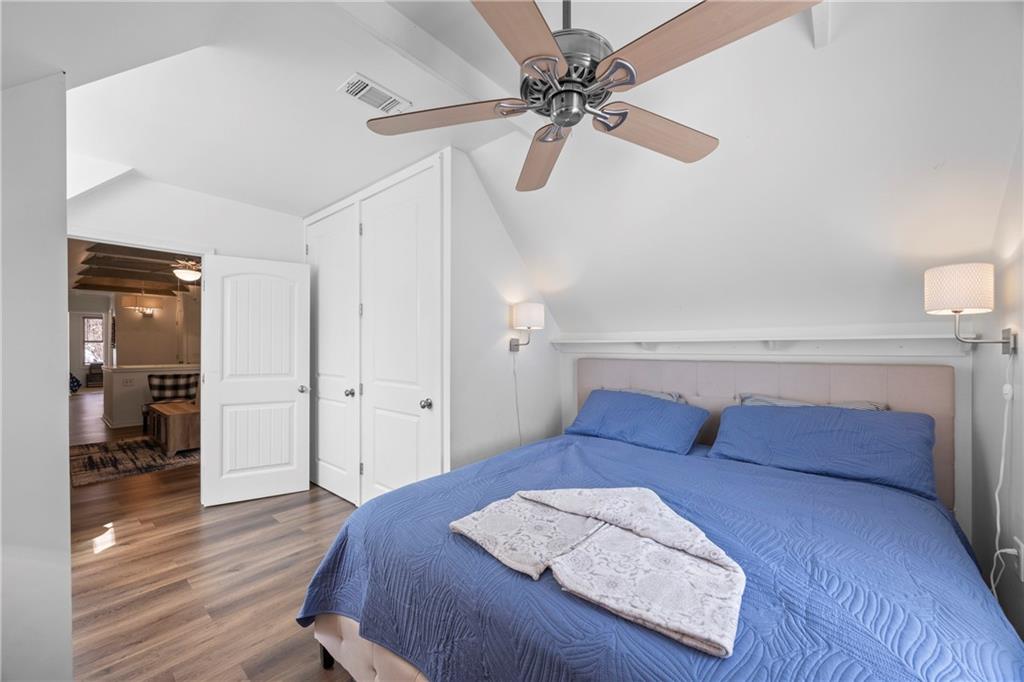 243 Bluegill Road Eatonton, GA 31024 - Photo 67 of 144 a living room with furniture and a wooden floor