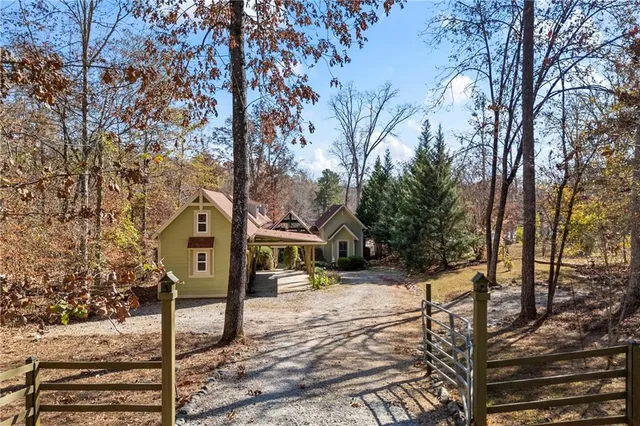 a large kitchen with a table and chairs