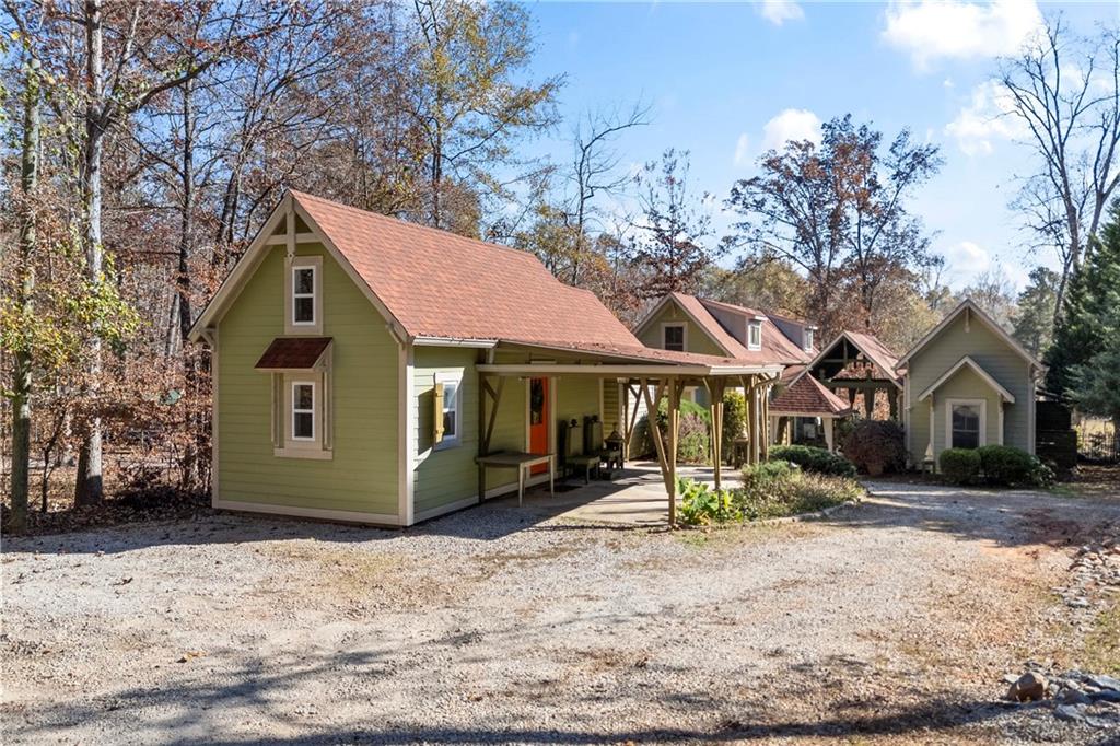 243 Bluegill Road Eatonton, GA 31024 - Photo 8 of 144 a front view of a house with a yard