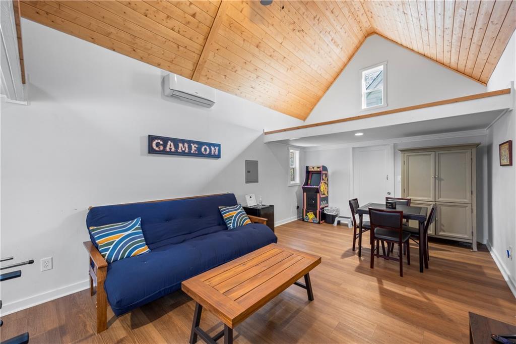 243 Bluegill Road Eatonton, GA 31024 - Photo 95 of 144 a living room with furniture and wooden floor