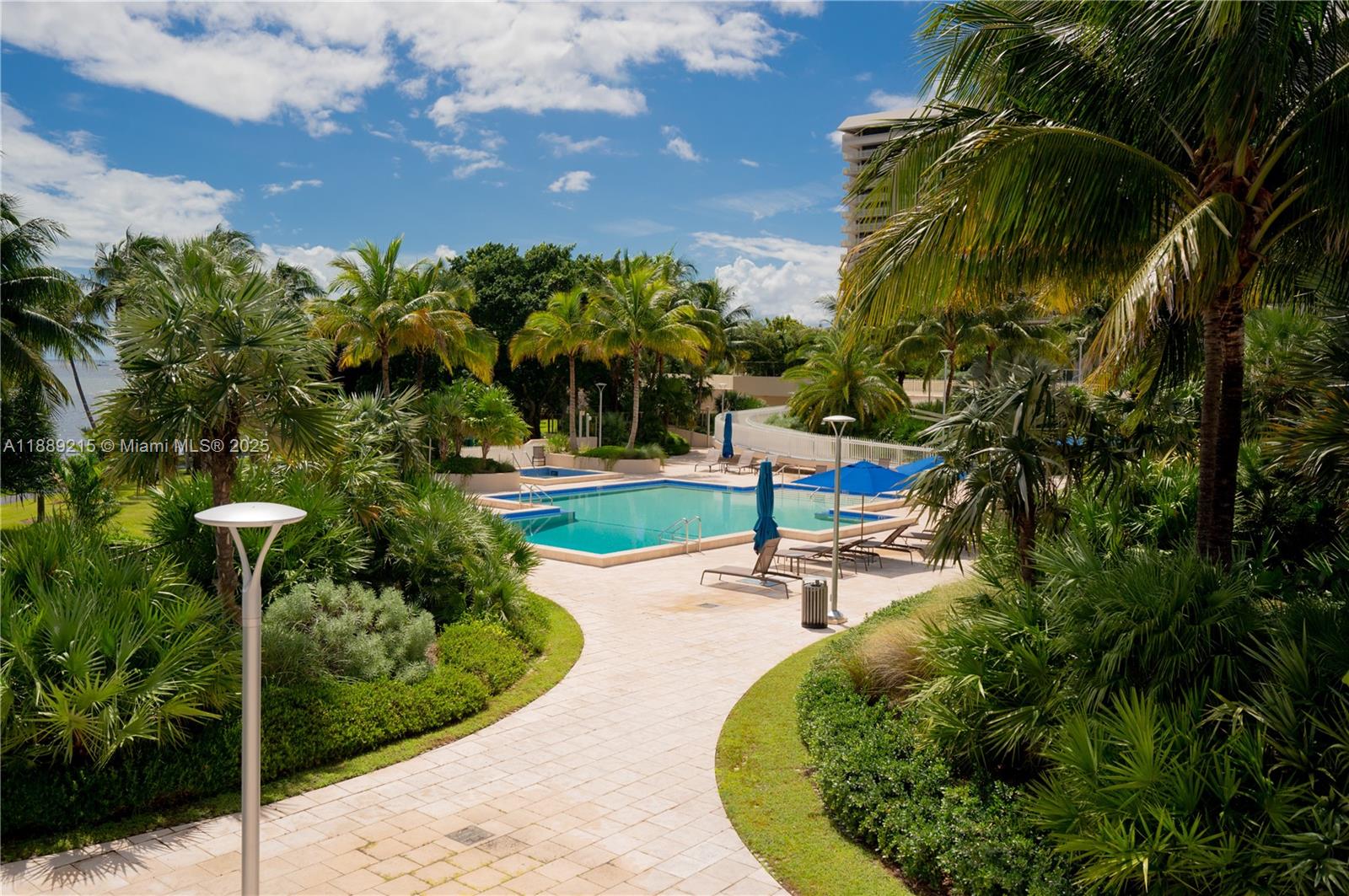 3 Grove Isle Drive, Unit C308 Miami, FL 33133 - Photo 23 of 54 a view of a backyard