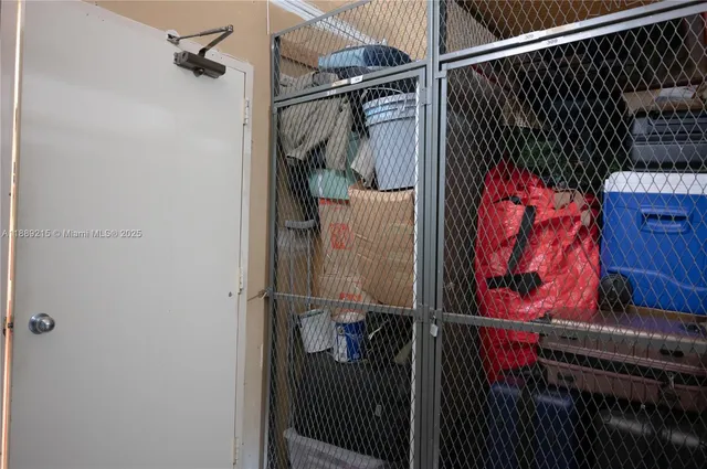 a lobby with furniture and potted plant
